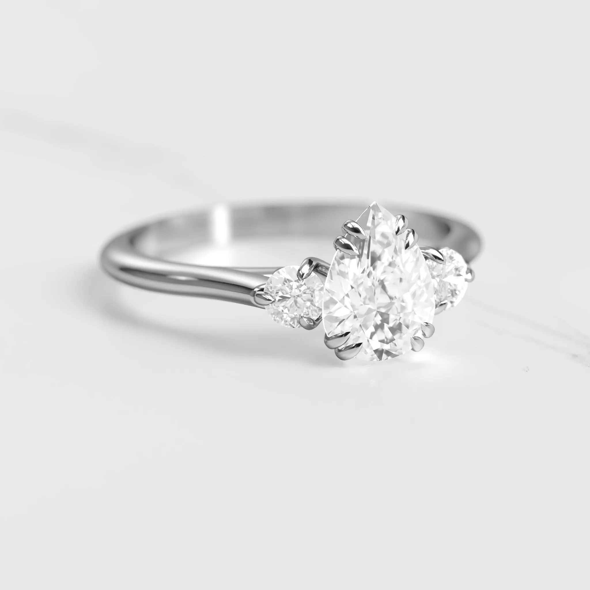 Pear Diamond Ring With Accent Stones